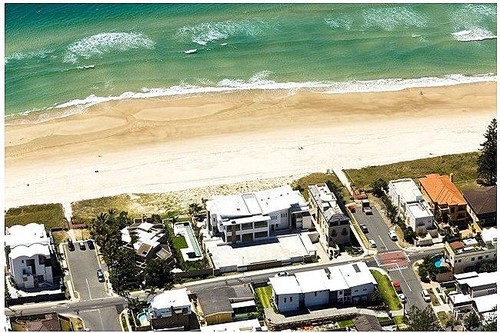 Some of the land alone on Hedges Ave, the Gold Coast, is currently worth many millions. With sea level rises, this front row will be inundated. © SW